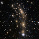 Illustration for article titled These Are Some of the Most Ancient and Distant Galaxies Ever Discovered—And They're Glorious